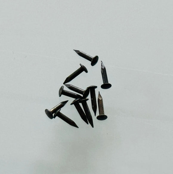 K144 - 1/4'' #18 Solid Br. Antiqued Escutcheon Pins (1 gr.)