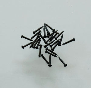 K144 - 1/4'' #20 Solid Br. Antiqued Escutcheon Pins (1 gr.)